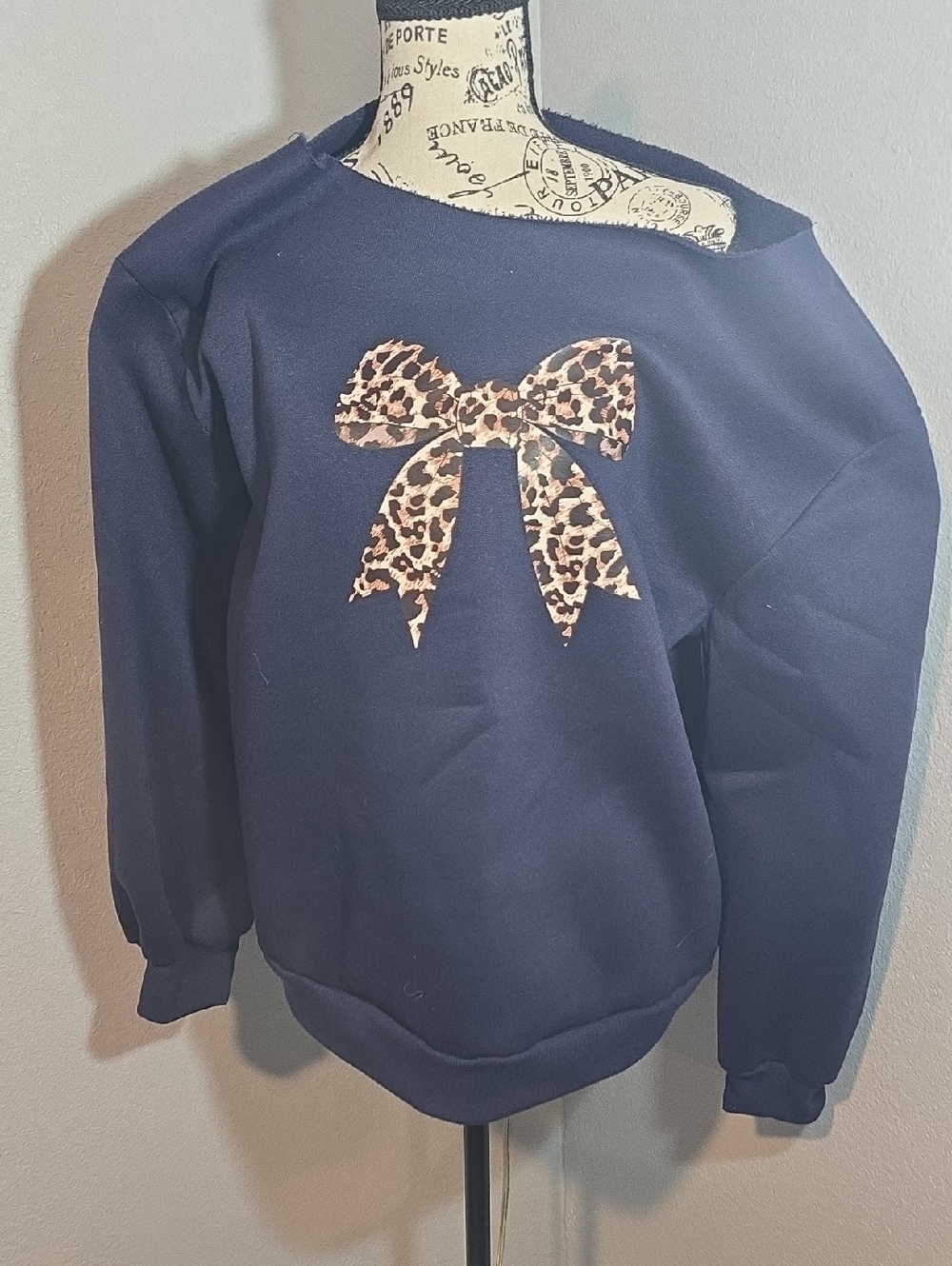 Navy Sweatshirt with Leopard Bow Graphic